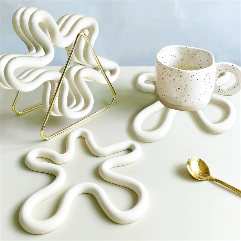 Alfombrilla de silicona geométrica resistente al calor, 1 y 2 piezas, posavasos para bebidas, soporte antideslizante para ollas, Individual para mesa.